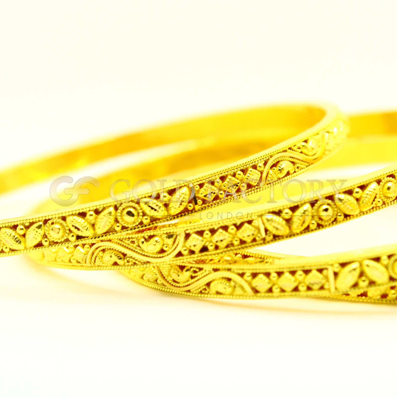 Buy Online Pretty Set Of Bangles Goldfactory Co Uk