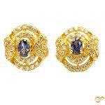 Alluring Beautiful Yellow Metal Studs/Tops with White and Purple CZ Stones