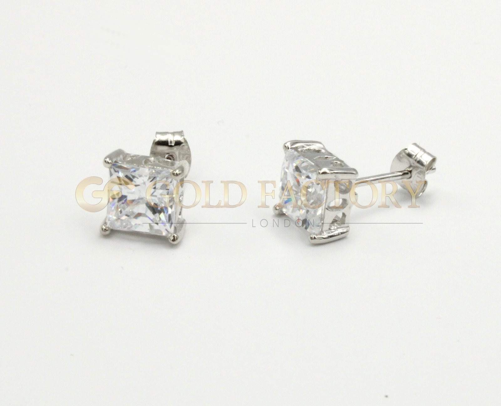 Pair of Lovely White Metal Studs